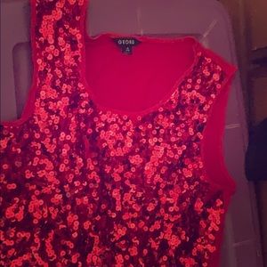 Red sequined blouse. Only worn twice
